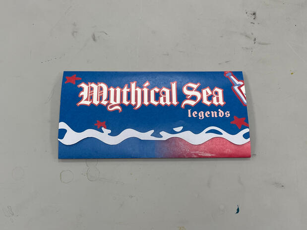 6/11, booklet front. There is a slit on the front which the middle water ripple tucks into.