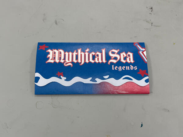 6/11, booklet front. There is a slit on the front which the middle water ripple tucks into.